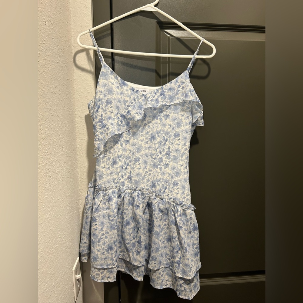 Blue flower dress. Brand new. Never worn. Ordered a M but fits like a small.